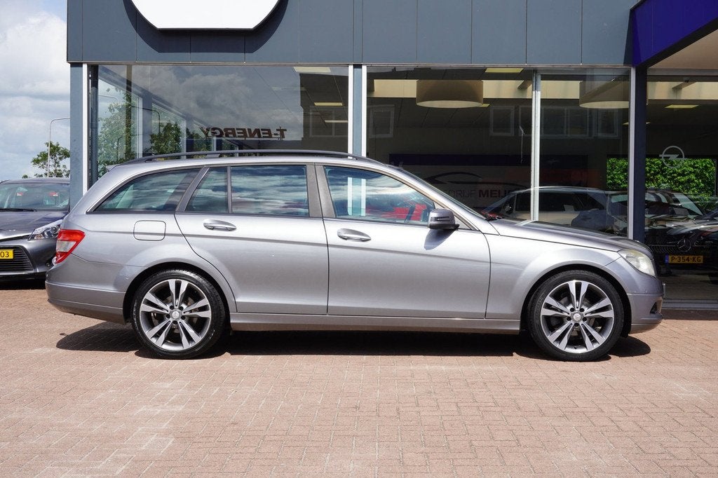 Mercedes-Benz C-klasse Estate 180 K Business Class Handgesch, Auto's, Mercedes-Benz, 13 km/l, Gebruikt, Zwart, 1435 kg