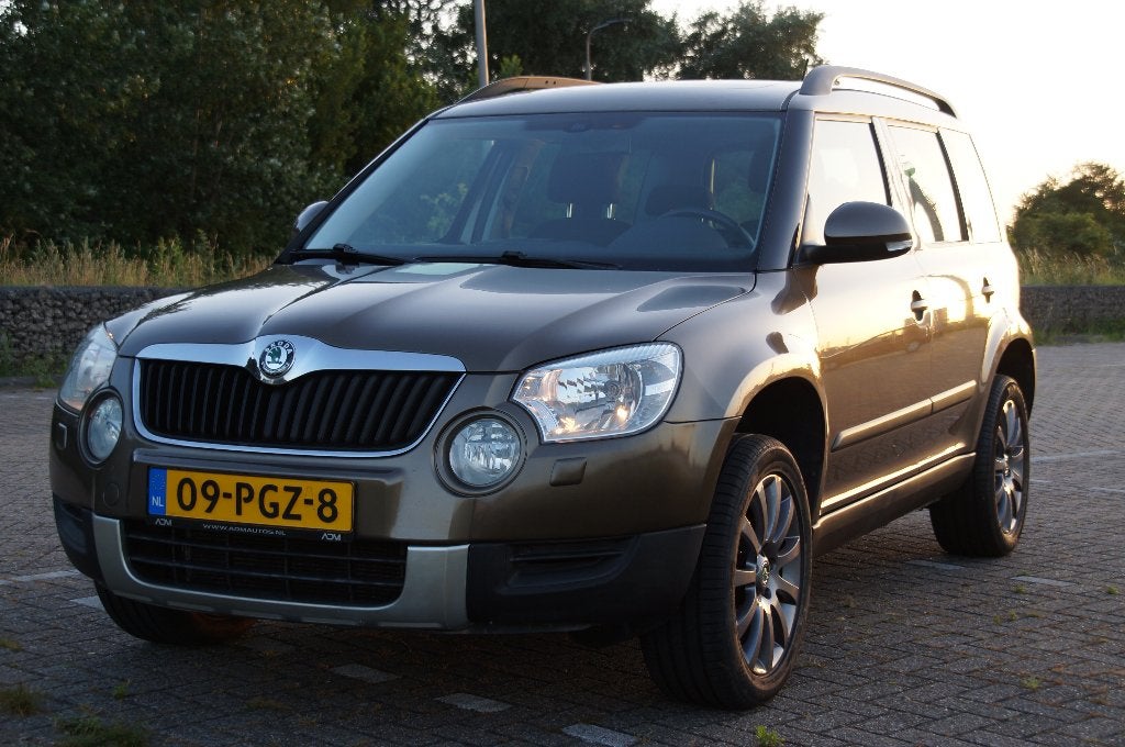 Skoda Yeti 1.2 TSI Ambition AIRCO CRUIS NAVI - KOOPJE, Auto's, Voorwielaandrijving, Beige, 4 cilinders, Bruin