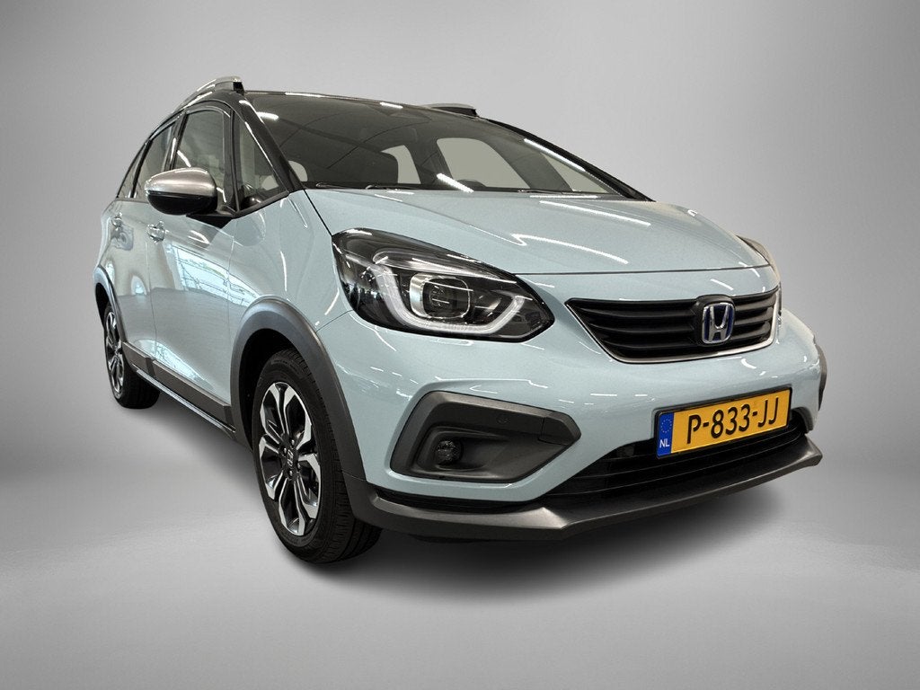 Honda Jazz 1.5 e:HEV Crosstar Two-tone | Camera | Adaptieve, Auto's, Honda, Stof, Euro 6, 4 cilinders, Blauw