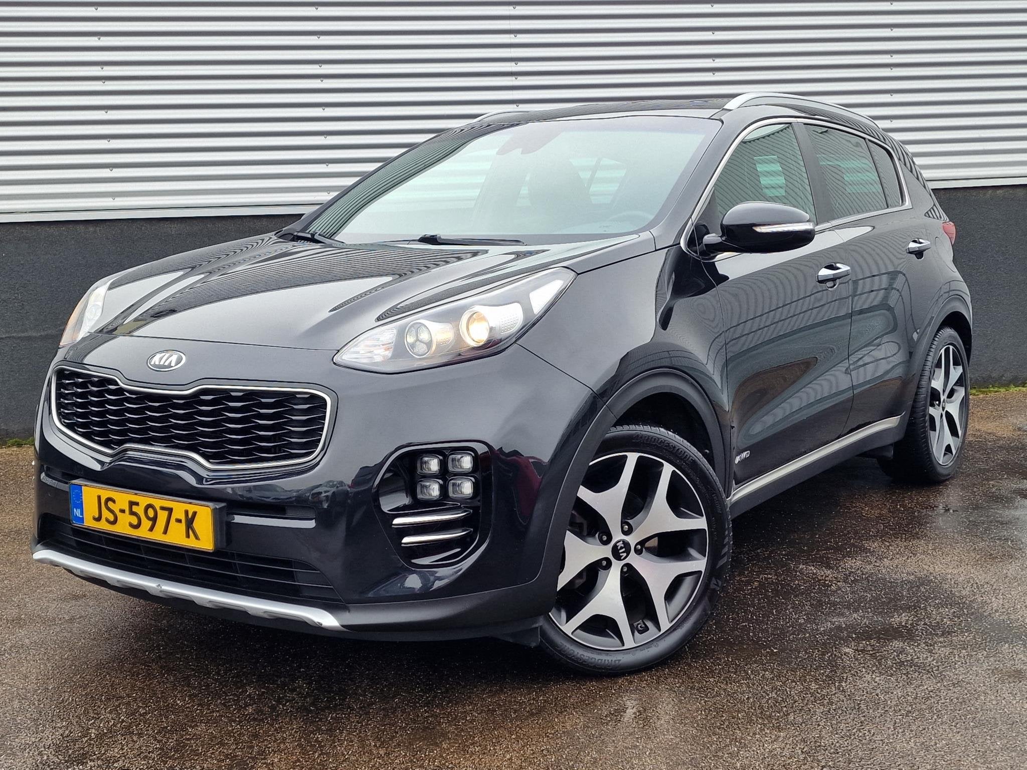 Kia Sportage 1.6 T-GDI 4WD GT-Line First Edition Nieuw gelev, Auto's, Parkeersensor, Gebruikt, 4 cilinders, Zwart