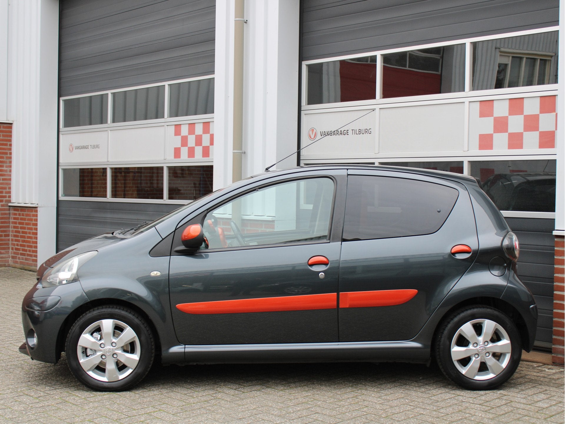 Toyota Aygo 1.0 VVT-i Dynamic Orange /AIRCO/Bluetooth/14'LM/, Euro 5, Gebruikt, 4 stoelen, Origineel Nederlands