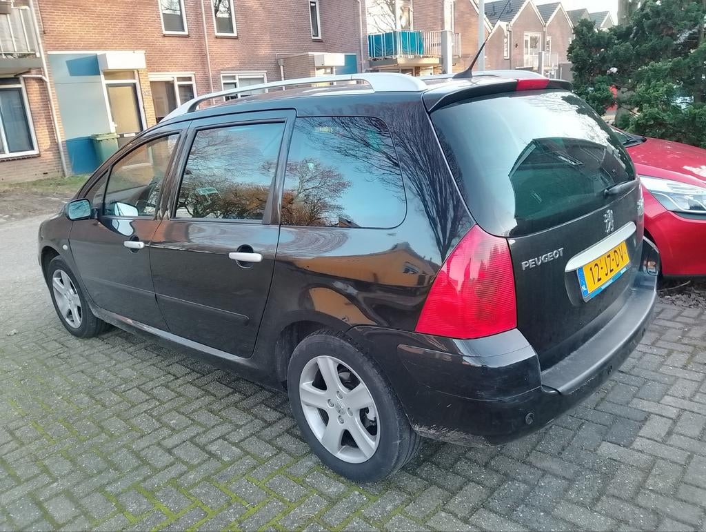 Peugeot 307 2.0 16V SW Roland Garros AUT 2002 Zwart, Auto's, Peugeot, 4 cilinders, 7 stoelen, Zwart, Particulier