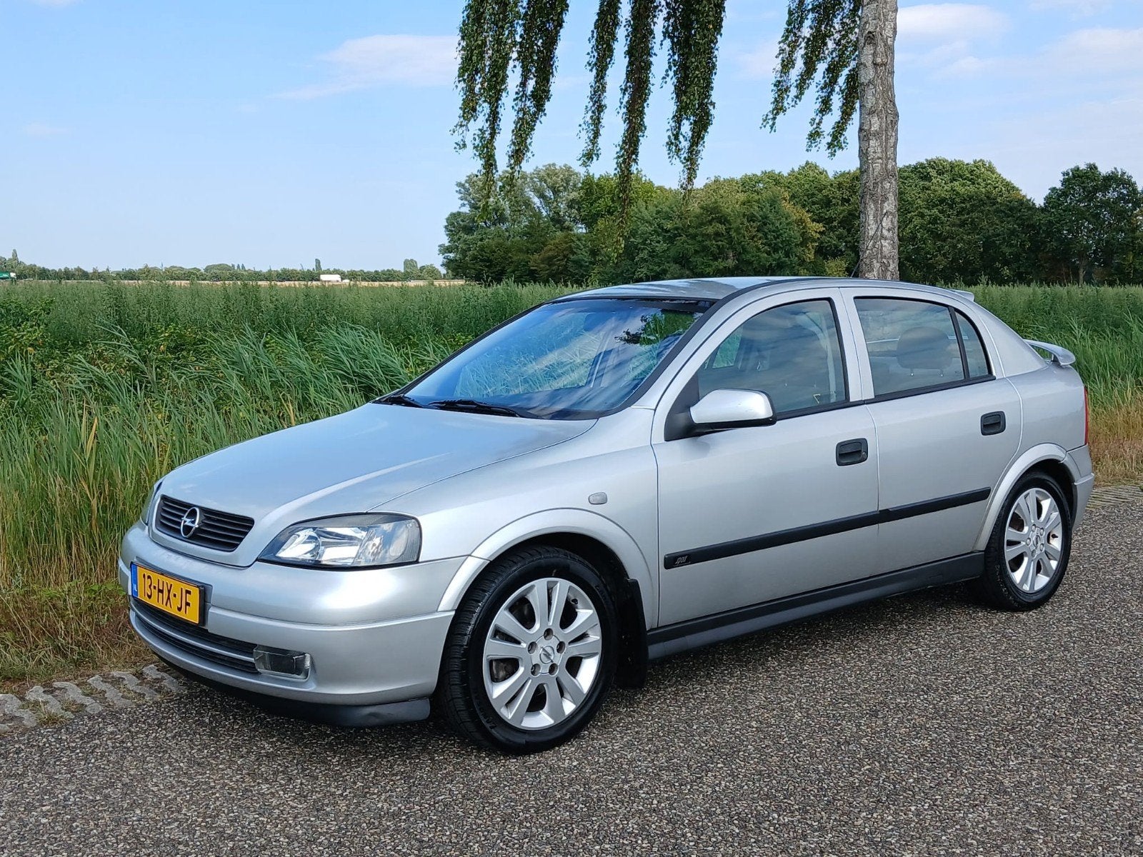 Opel Astra 2.2 16V Sport Edition AIRCO, Auto's, Voorwielaandrijving, 4 cilinders, 610 kg, Origineel Nederlands