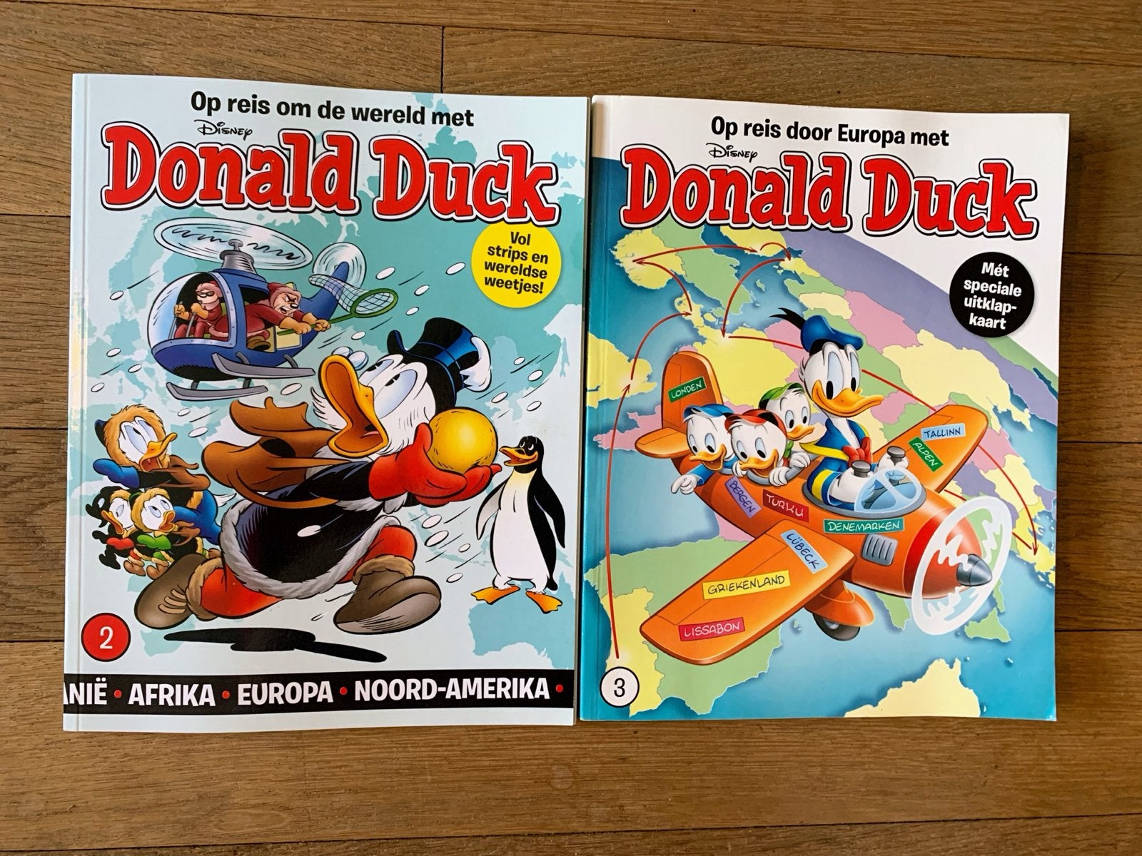 Donald Duck Op reis om de wereld en door Europa (2 boeken), Boeken, Meerdere stripboeken, Ophalen of Verzenden, Zo goed als nieuw