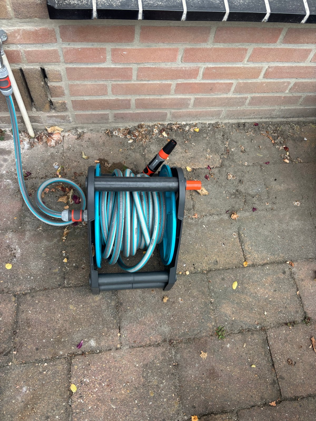 Gardena tuinslanghaspel met slang en spuitstuk, Tuin en Terras, Ophalen, Zo goed als nieuw, Tuinslanghaspel
