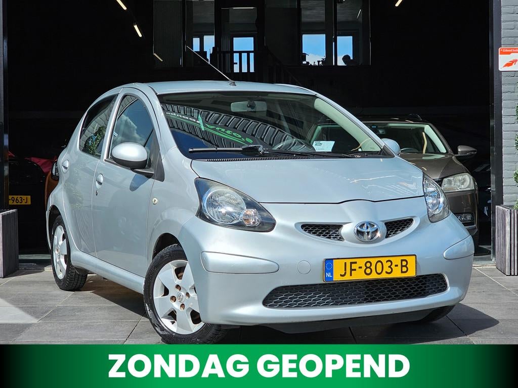 Toyota Aygo 1.0-12V|Airco|El. Ramen|AUX|5 deurs|APK, Auto's, Toyota, Voorwielaandrijving, Stof, Gebruikt, Huisgarantie
