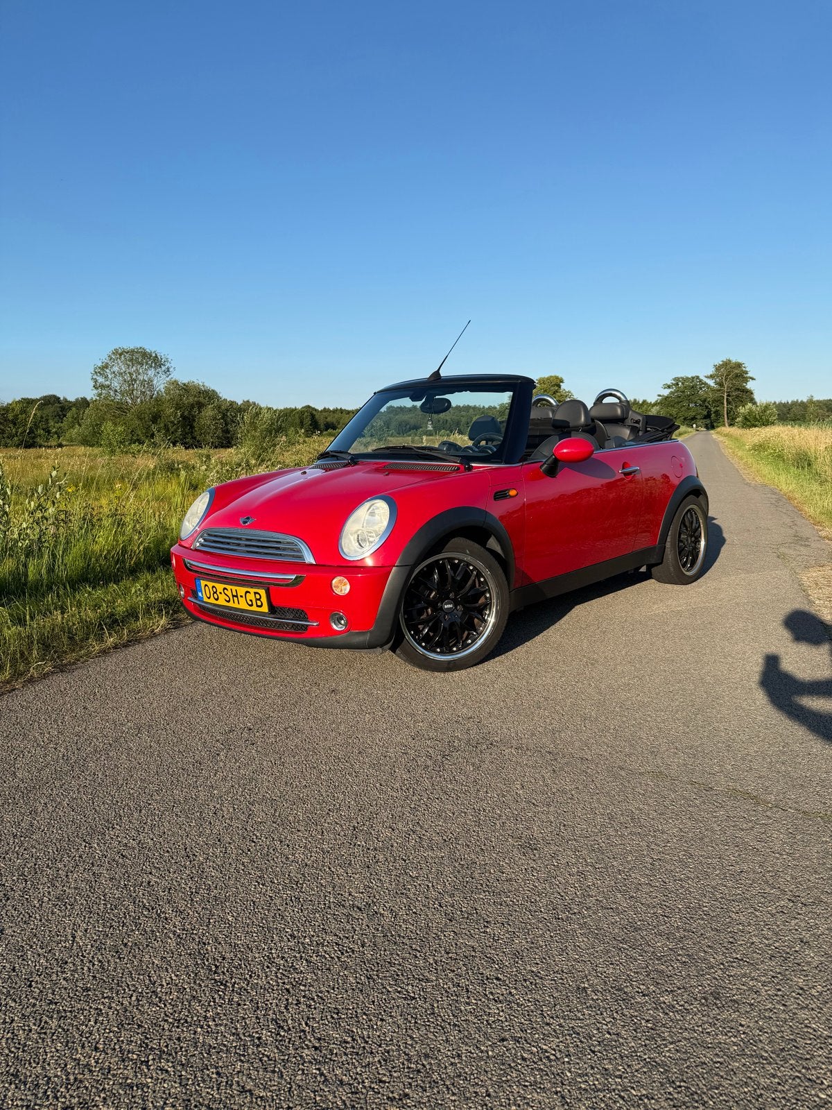 Mini 1.6 16V Cooper Cabrio 2006 Rood, Auto's, Voorwielaandrijving, Lederen bekleding, 4 cilinders, Cabriolet