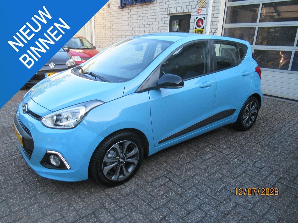 Hyundai i10 1.0i i-Motion Premium world cup, Auto's, Hyundai, Voorwielaandrijving, Stof, Gebruikt, Blauw