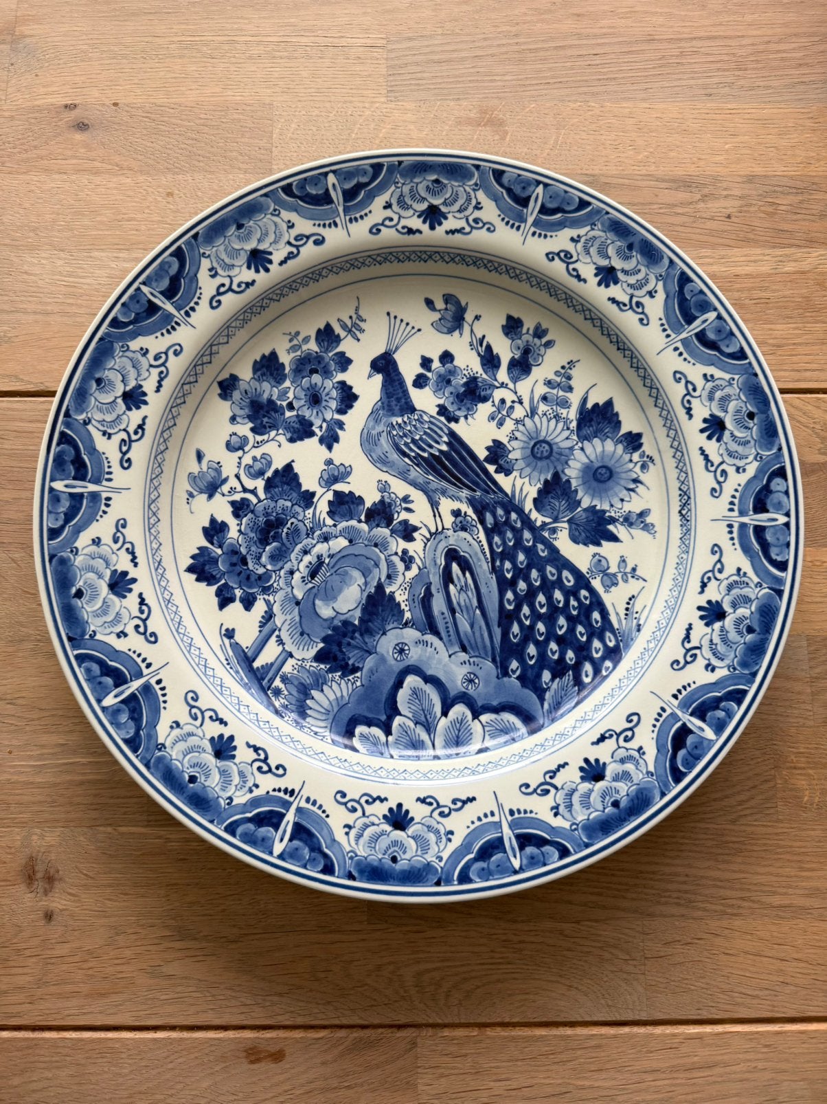 Delfts Blauw sierbord met pauw en bloemmotief, Ophalen of Verzenden