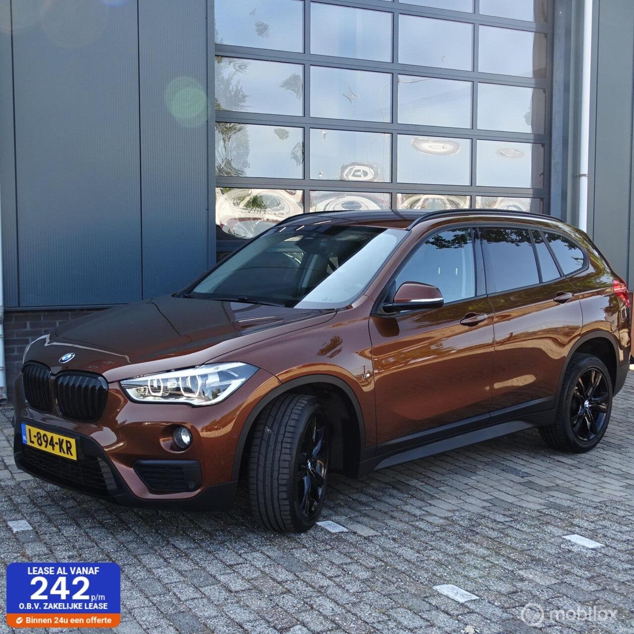 BMW X1 sDrive18i High Executive, 136 pk, Gebruikt, Euro 6, Bruin