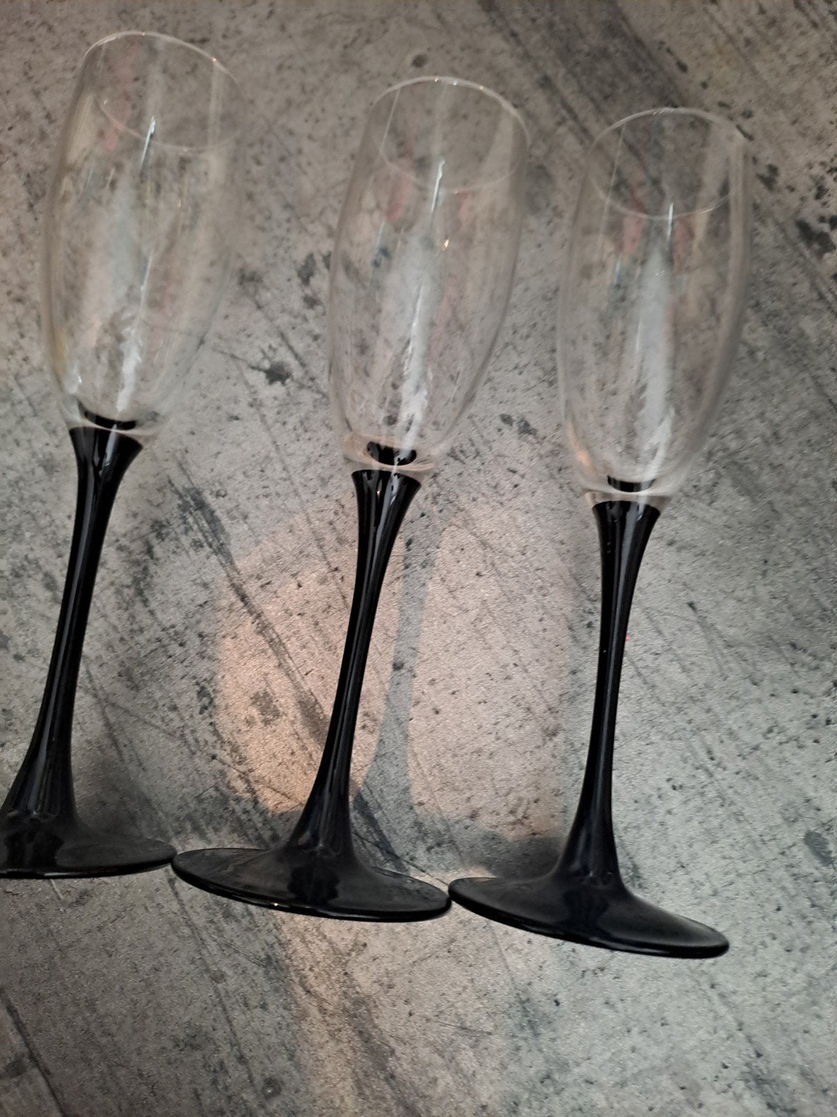 Luminarc champagne glazen zwarte voet 22 cm hoog, Verzamelen, Glas en Borrelglaasjes, Ophalen of Verzenden, Zo goed als nieuw