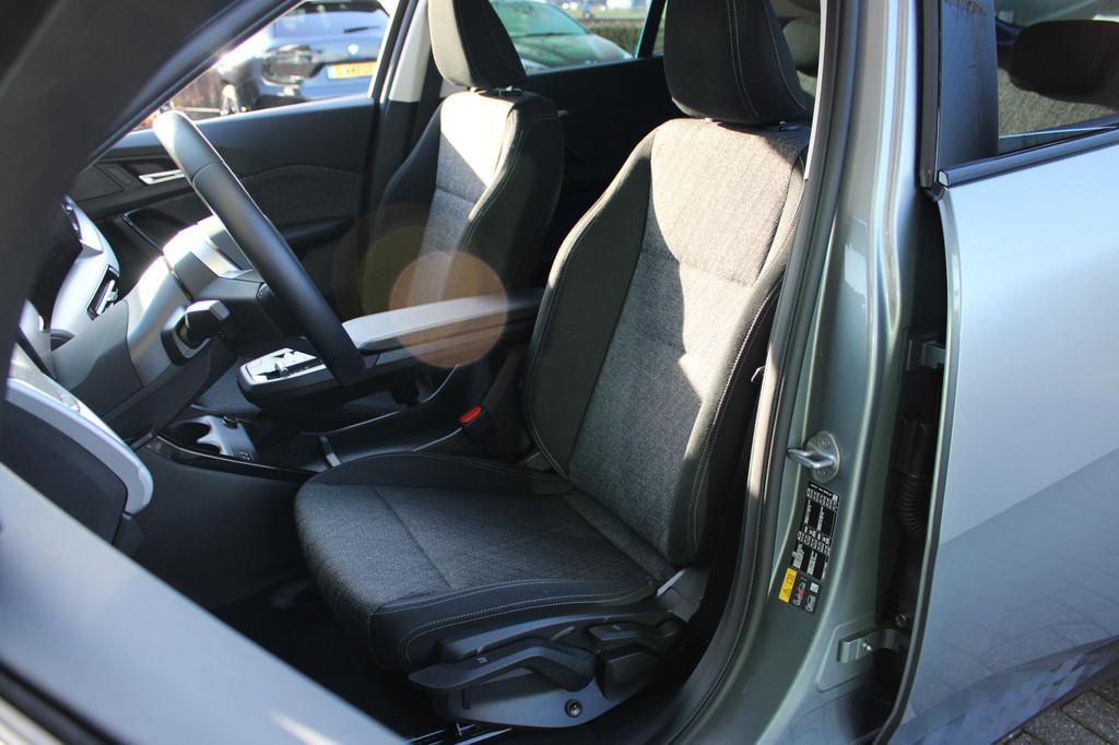 BMW iX2 eDrive20 / Achteruitrijcamera / PDC (bj 2025), Auto's, BMW, 478 km, Stof, 750 kg, Met garantie (alle)