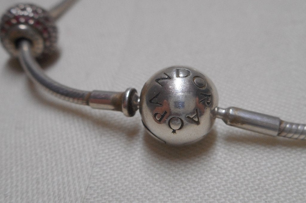 Zilveren Pandora armband met 5 bedel stoppers nr.1549, Sieraden, Tassen en Uiterlijk, Armbanden, Verzenden, Zo goed als nieuw