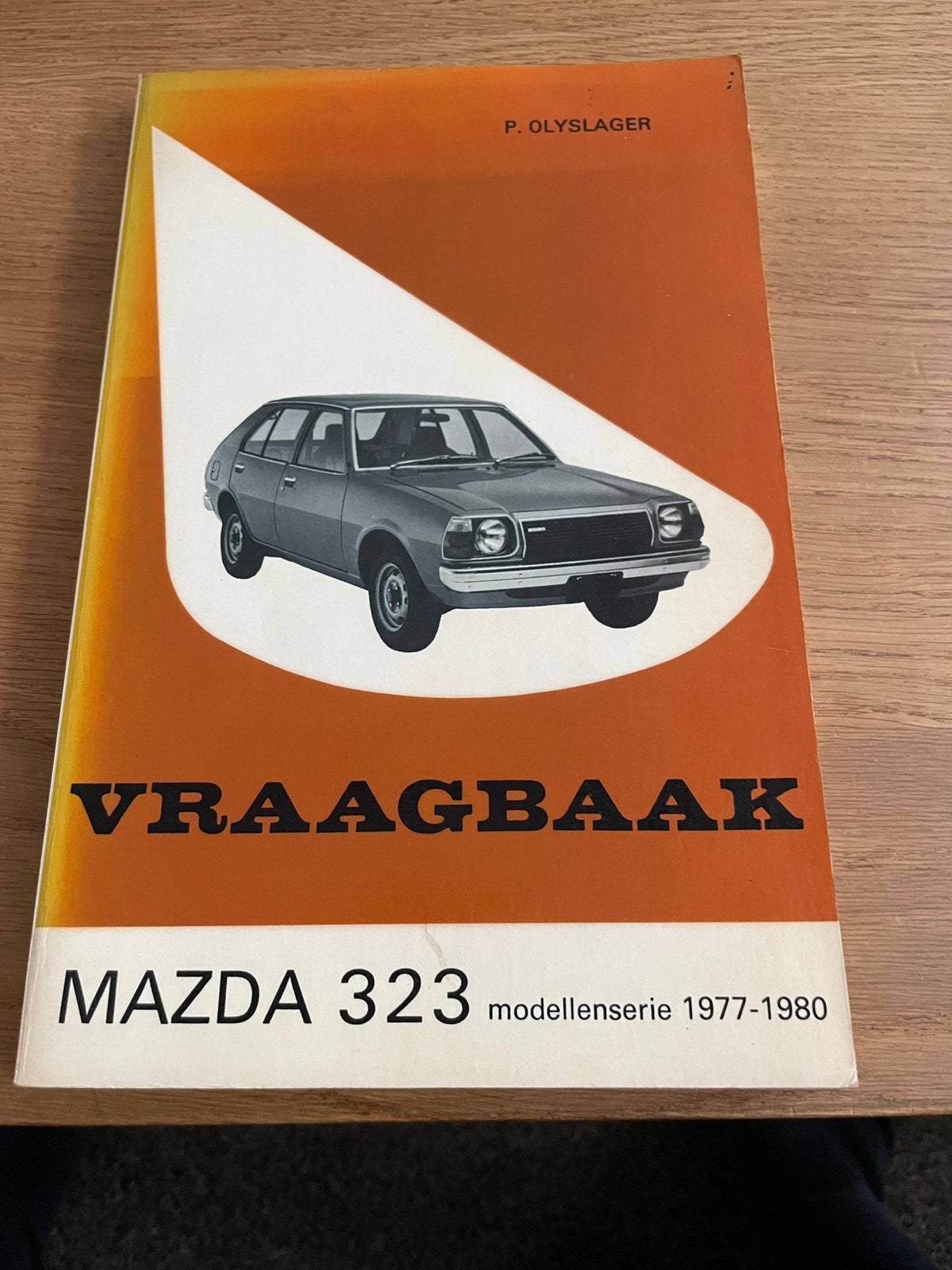 Vraagbaak mazda 323 isbn 9020114964, Ophalen, Zo goed als nieuw, Mazda