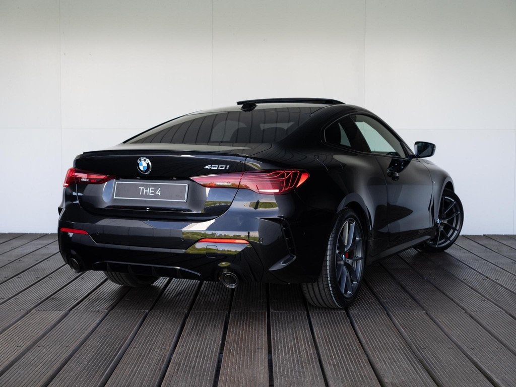 BMW 4 Serie Coupé 420i M Sport Pro | Schuif-/kanteldak | Ha, Auto's, BMW, Automaat, 1998 cc, Met garantie (alle), 4 stoelen