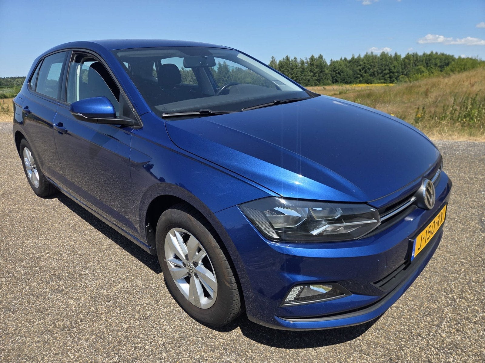 Volkswagen Polo 1.0 TSI 95pk 2020 Blauw, Voorwielaandrijving, Parkeerassistent, Stof, Zwart