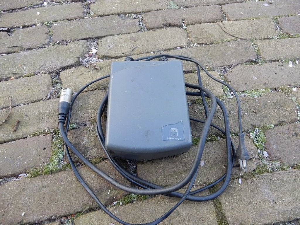 Originele acculader voor een sparta/ batavus ION, Ophalen of Verzenden, Gebruikt