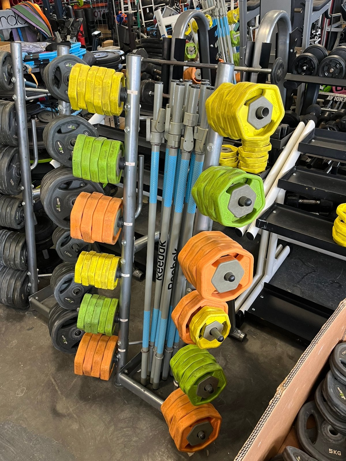 10 x reebok rep bodypump sets met rek, Ophalen, Gebruikt, Reebok, Met rek