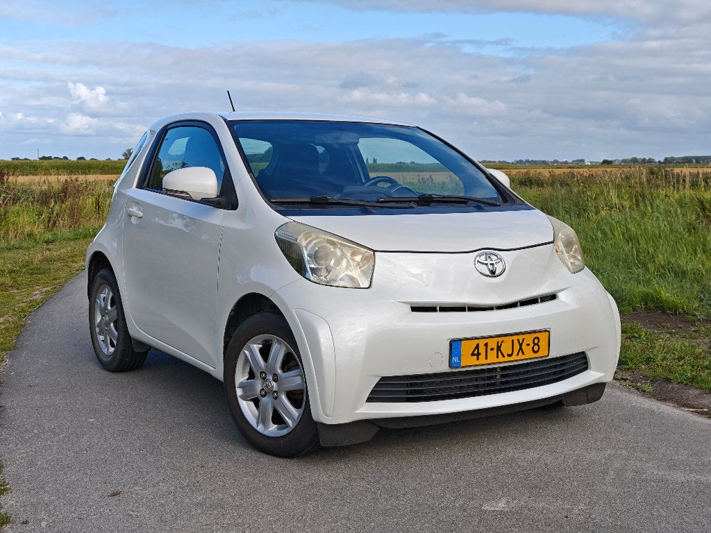 Toyota IQ 1.0 2009 Parelmoer Wit, Stof, Zwart, 4 stoelen, Handgeschakeld