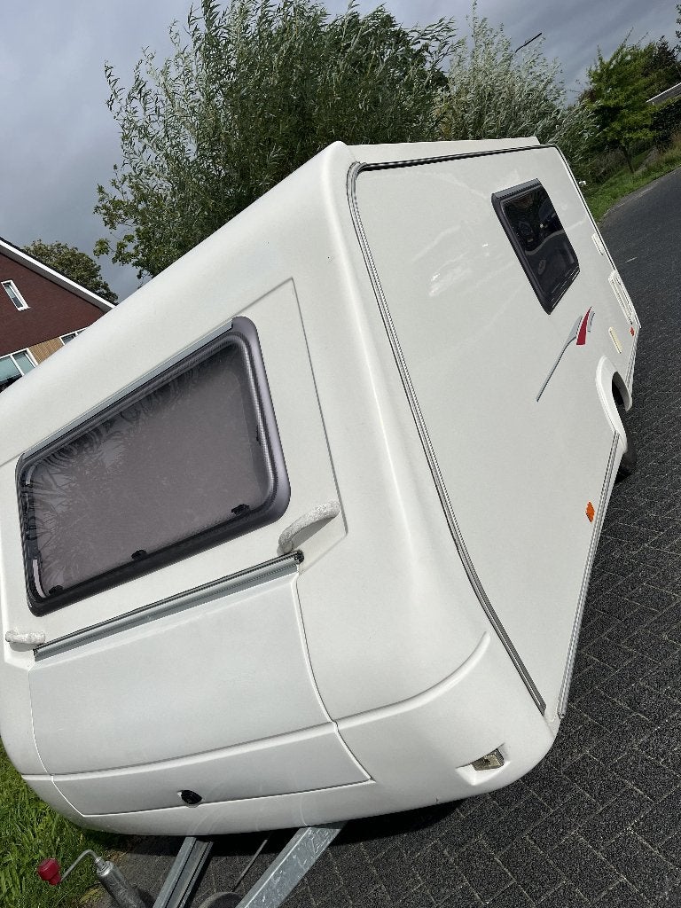 Zeer mooie Trigano Rubis 420 hefdakcaravan, Caravans en Kamperen, Trigano, Bedrijf, Treinzit, 750 - 1000 kg