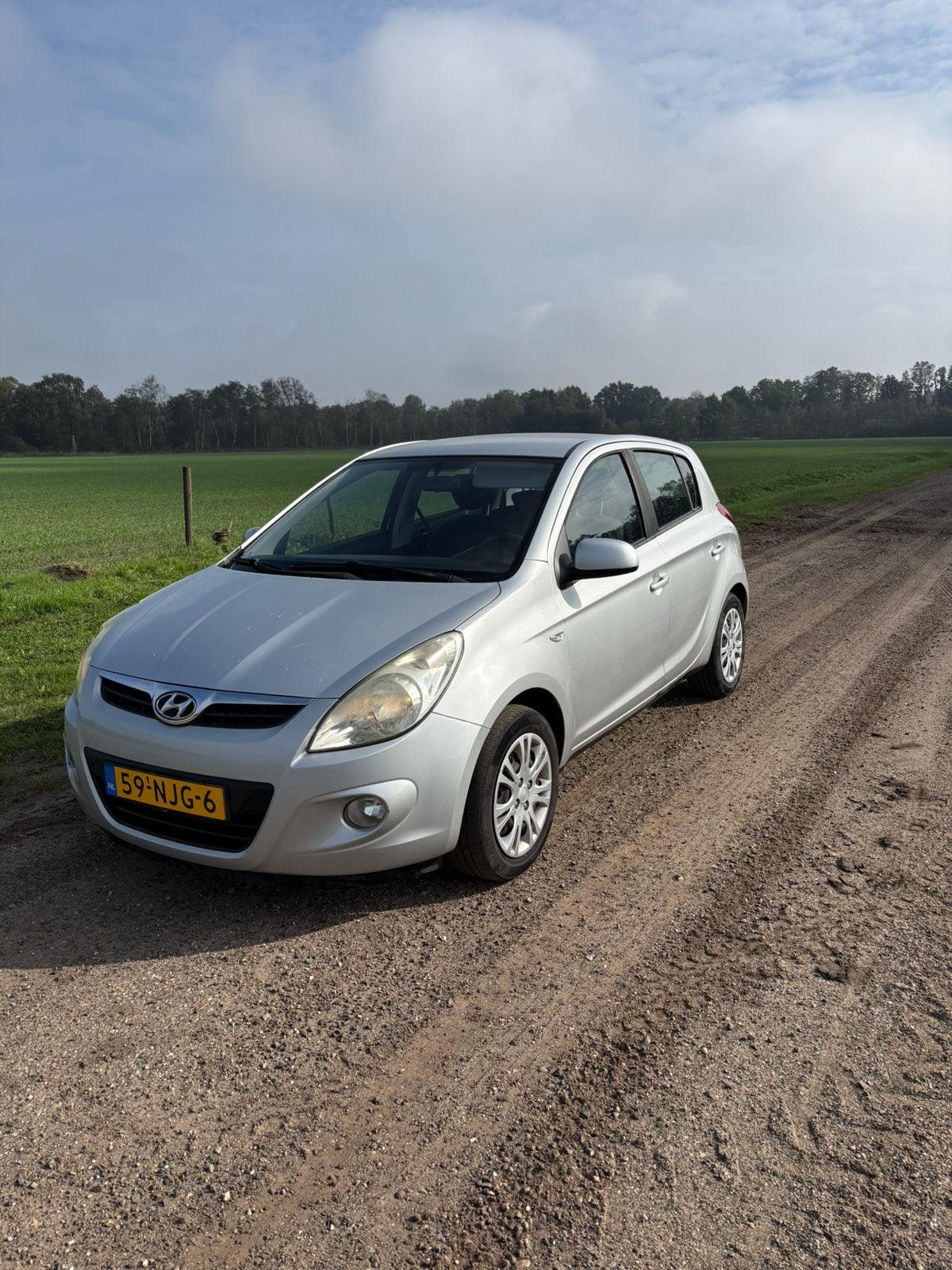 Hyundai i20 1.2 5-DRS 2010 Grijs, Auto's, 450 kg, 31 €/maand, 4 cilinders, Origineel Nederlands