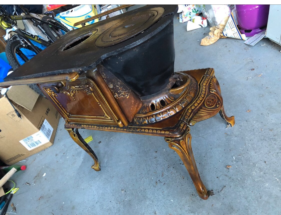 Antieke platte buis kachel “ schippertje “ €200 ophalen, Huis en Inrichting, Ophalen, Gebruikt, Hout, Houtkachel