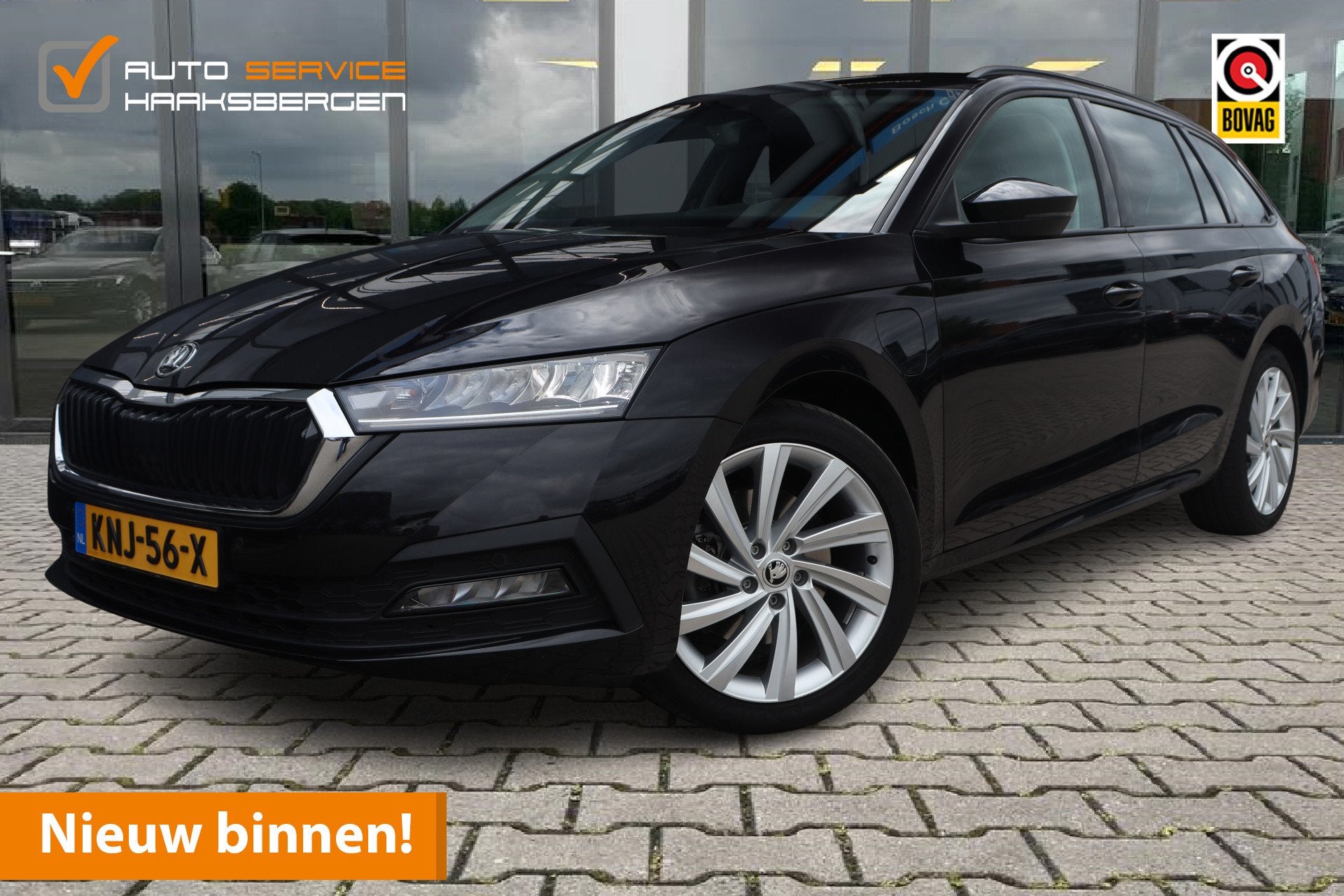 Skoda Octavia Combi 1.4 TSI iV PHEV Business Edition | ACC |, Gebruikt, Leder en Stof, Zwart, Plug-in hybride