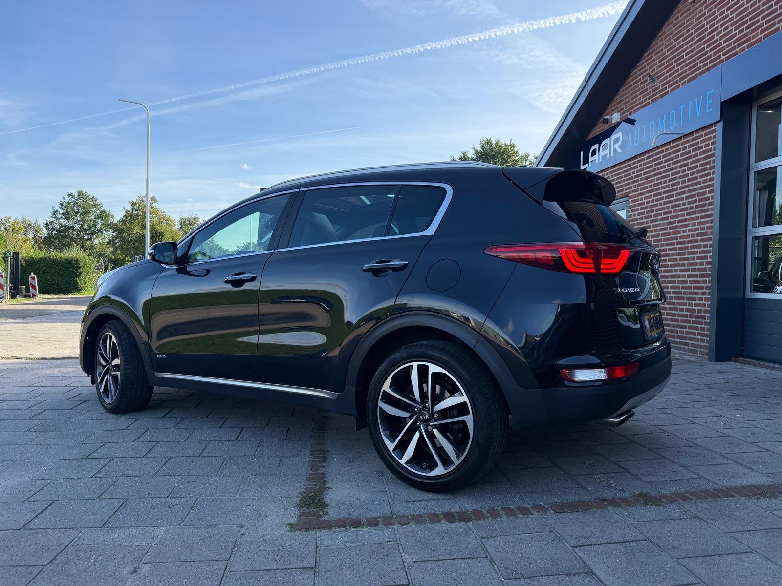 Kia Sportage 1.6 T-GDi 177PK 4WD GT-Line Automaat Navi | Cam, Auto's, Dealer onderhouden, Gebruikt, 4 cilinders, Zwart