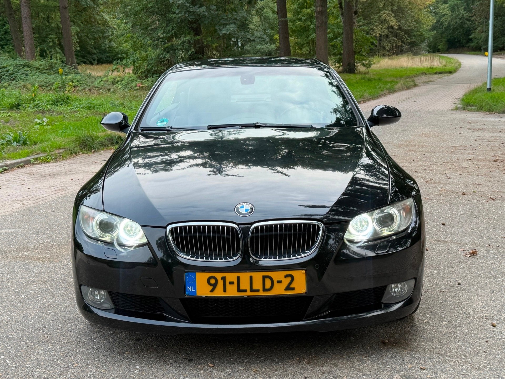 BMW 3-serie Cabrio 325i 2009 Zwart Automaat, Auto's, Dealer onderhouden, Achterwielaandrijving, Gebruikt, Zwart