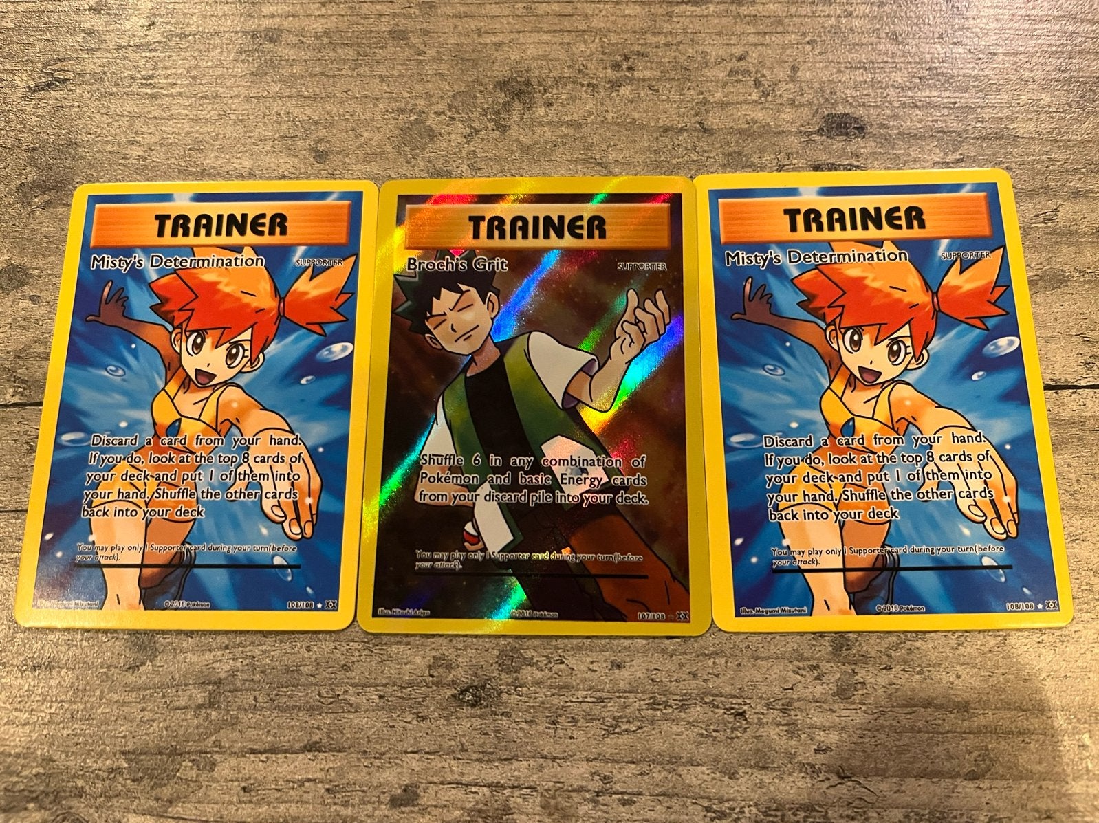 Pokémon Trainer Kaarten: Misty's Determination & Brock's Gri, Ophalen of Verzenden, Gebruikt, Meerdere kaarten, Foil