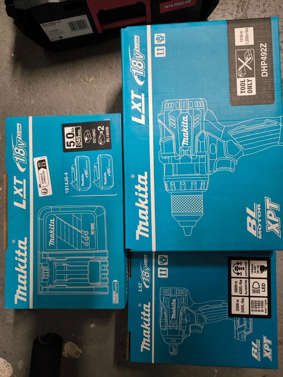 Makita DHP492Z, DTW300Z set met 2x 5.0Ah accu en lader, Ophalen, 600 watt of meer, Nieuw, Boor- en Schroefmachine