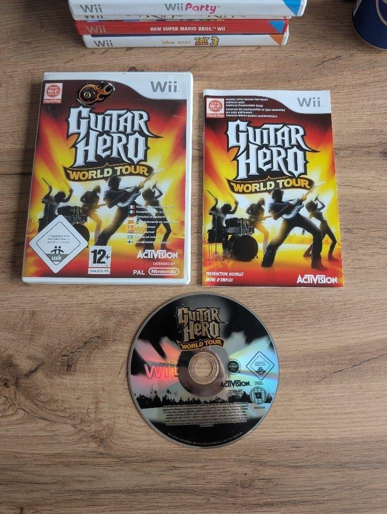 Guitar hero world tour WII, Spelcomputers en Games, Games | Nintendo Wii, Muziek, Ophalen of Verzenden, Zo goed als nieuw, 3 spelers of meer