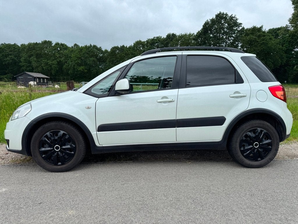 Suzuki SX4 1.6 Shogun met airco, Gebruikt, Zwart, 4 cilinders, Origineel Nederlands