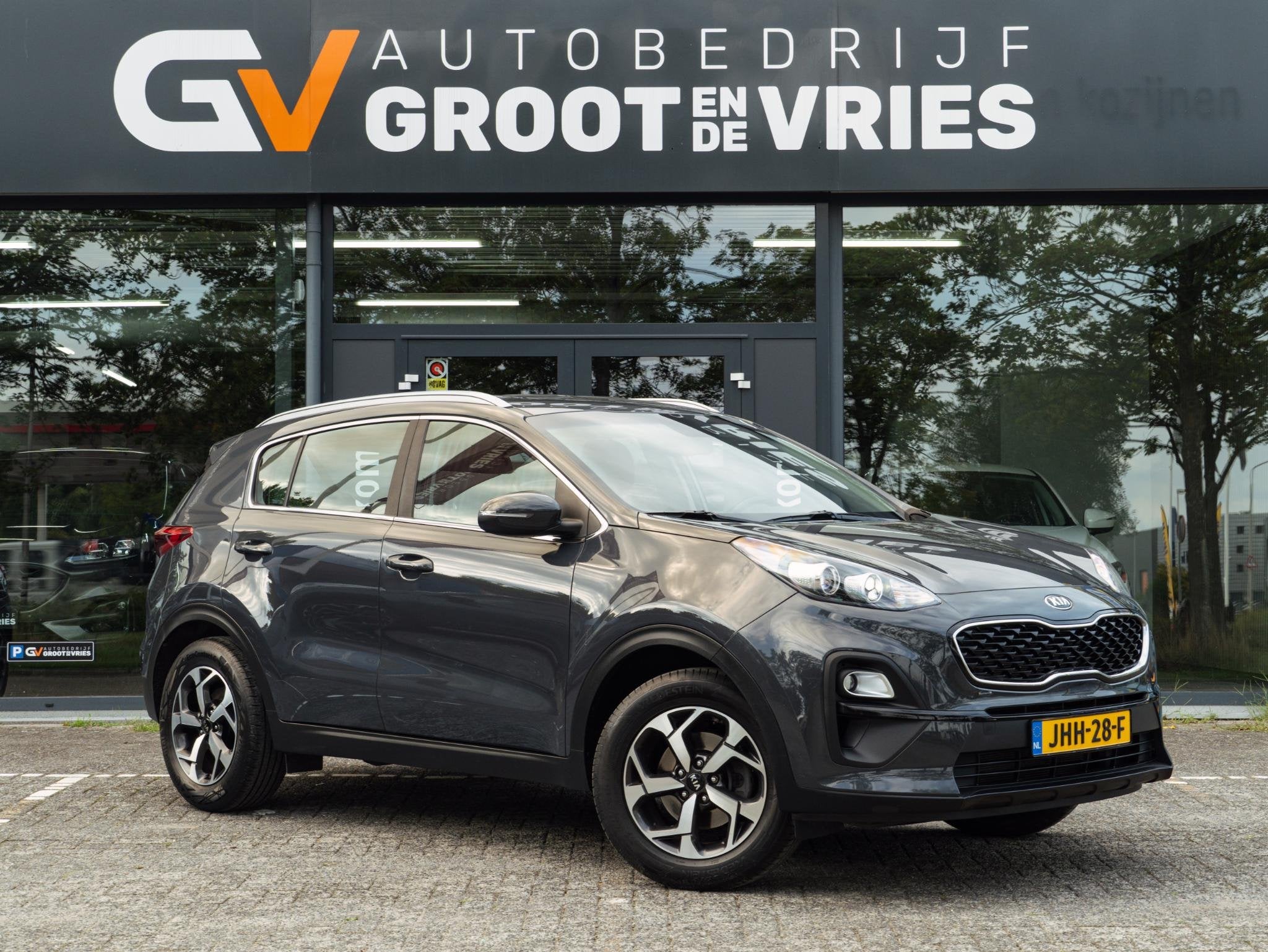 Kia Sportage 1.6 GDI DynamicLine|Trekhaak|Camera, Auto's, Stof, Gebruikt, 4 cilinders, 132 pk