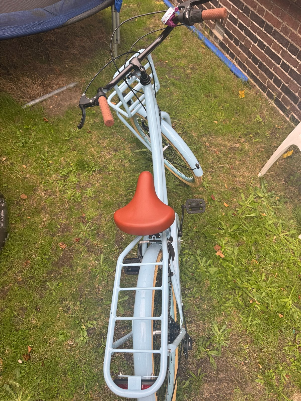 Foto 5 van Mooie lichtblauwe kinderfiets met bagagedrager