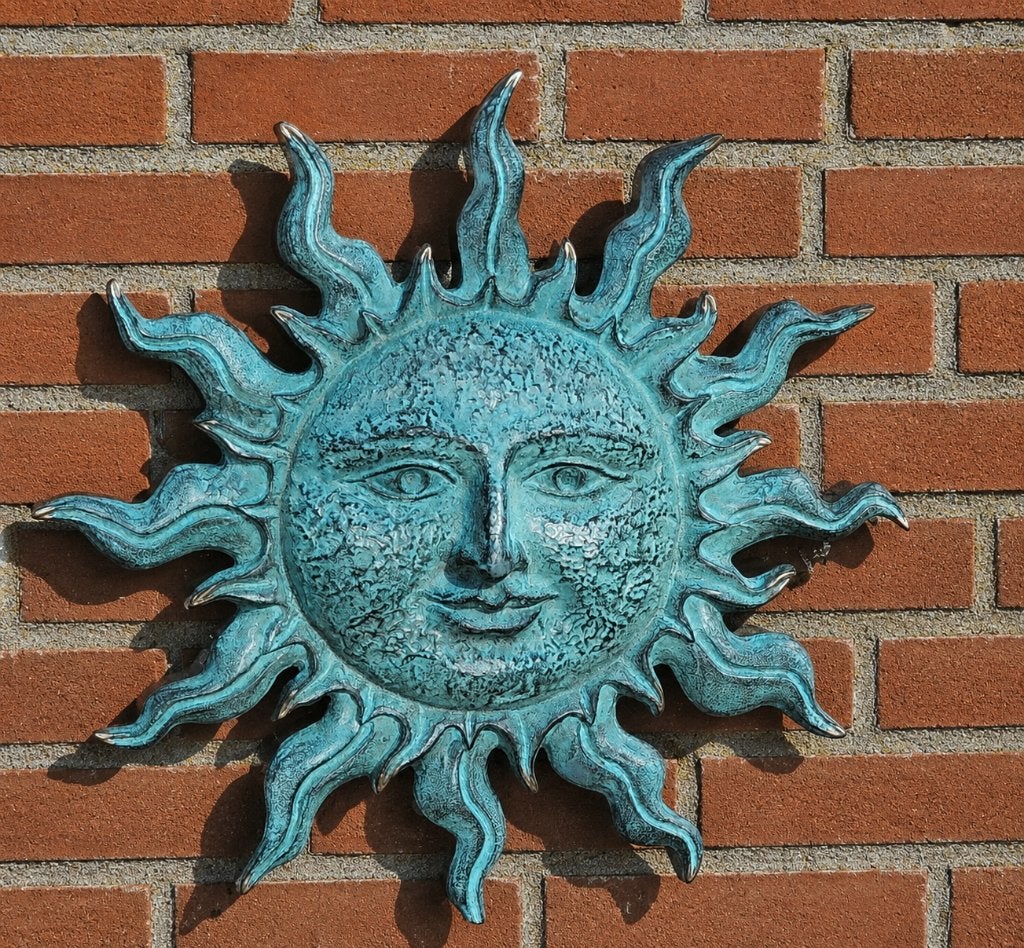 ZON / muurdecoratie / brons