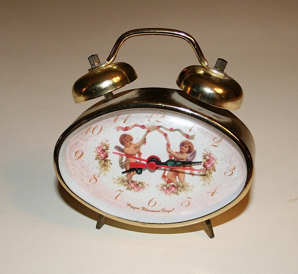 Mechanische mini-wekker met engeltjes, Ophalen of Verzenden