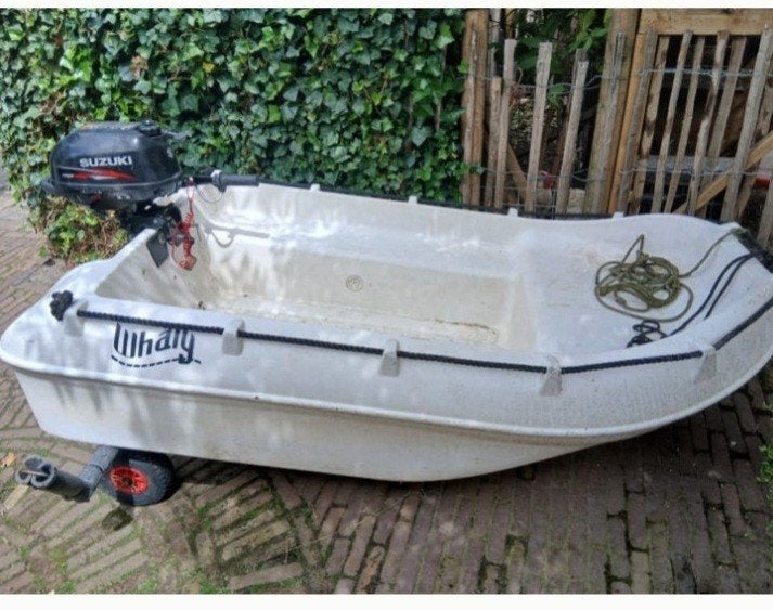 Boot Whaly met 2,5 pk buitenboordmotor en looptrailer, Ophalen of Verzenden