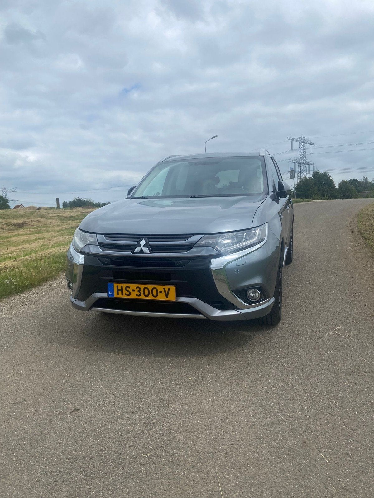 Mitsubishi Outlander 2.0 Dohc Mivec Phev 203pk 4WD CVT 5P, Auto's, 1998 cc, Outlander, Zwart, 4 cilinders