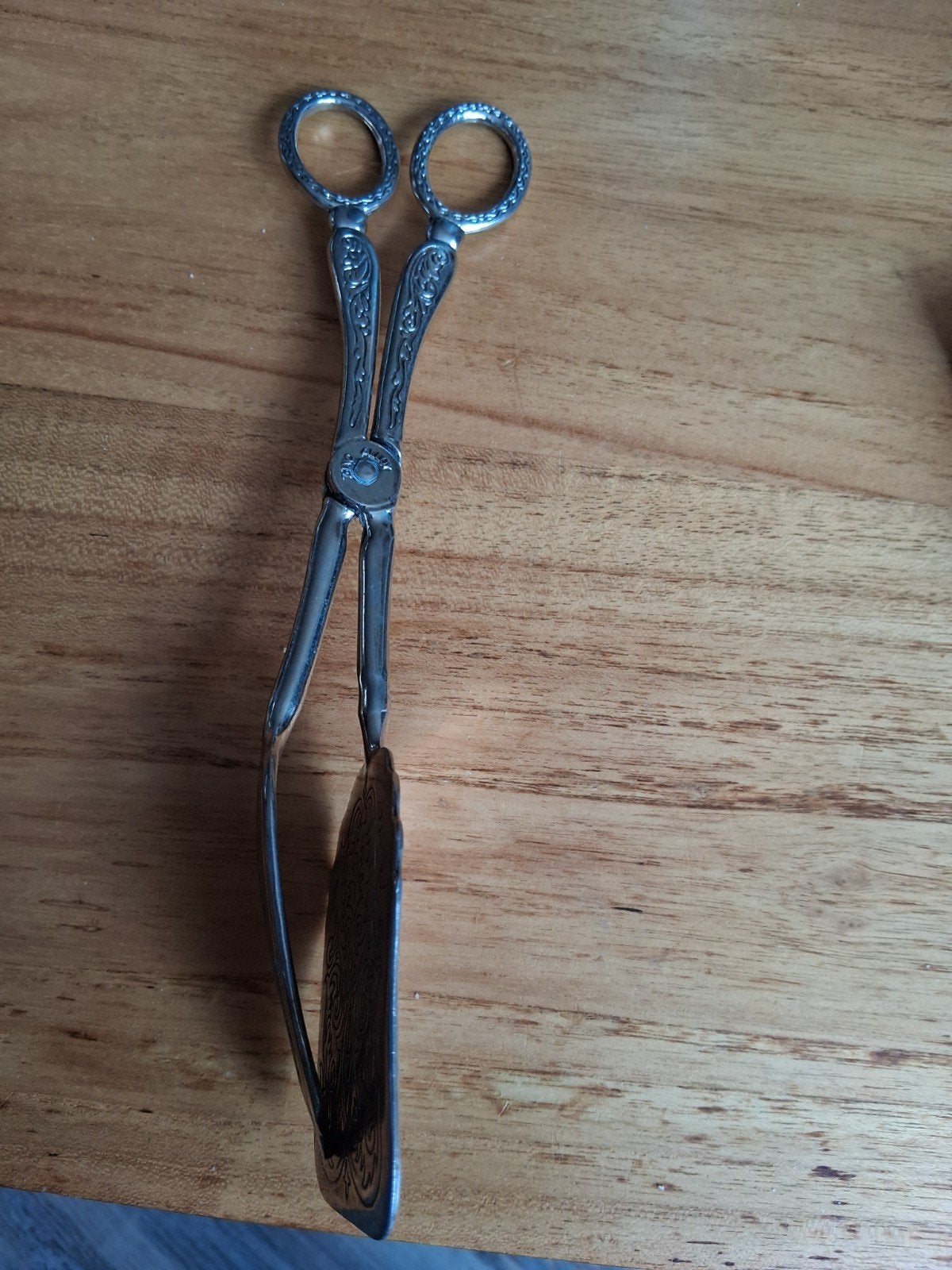 Vintage Verzilverde Tang met Sierlijke Details, Ophalen