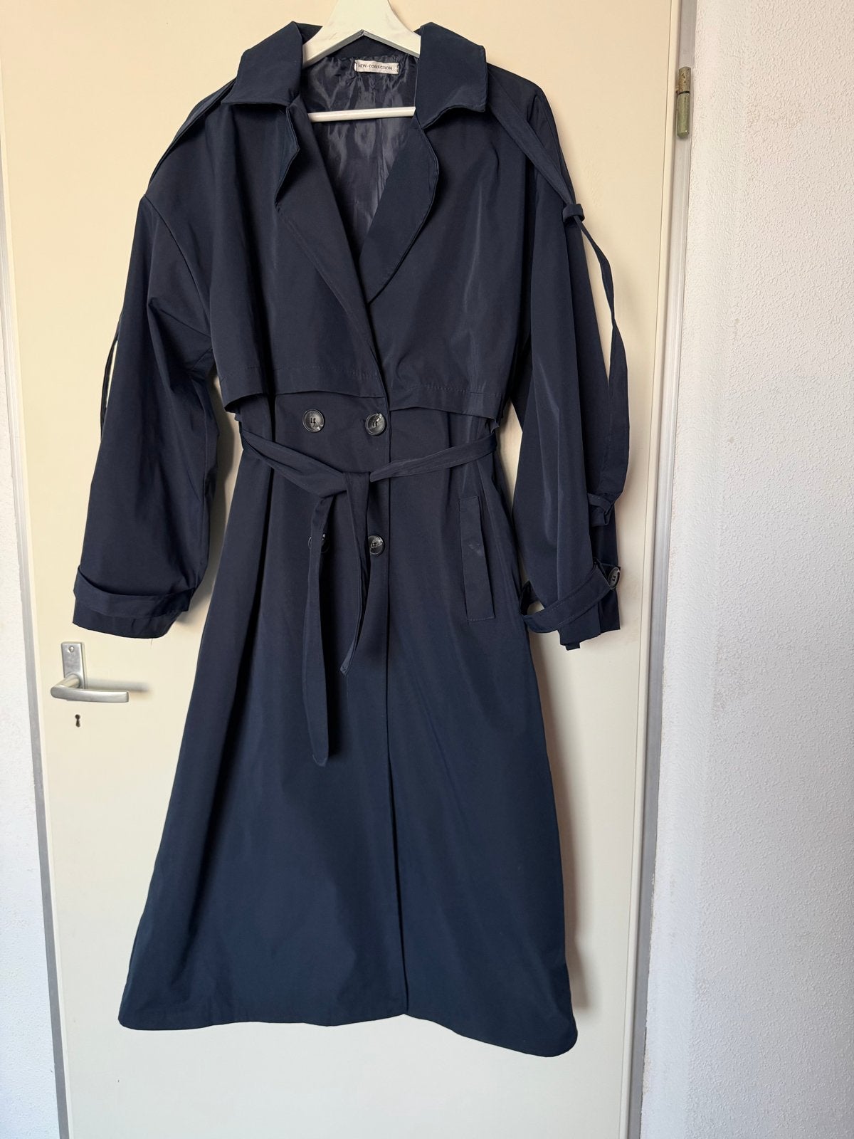 New Collection D.Blauw Lange Trenchcoat Jas maat L/XL ZGAN, Maat 42/44 (L), Zo goed als nieuw, New Collection, Verzenden
