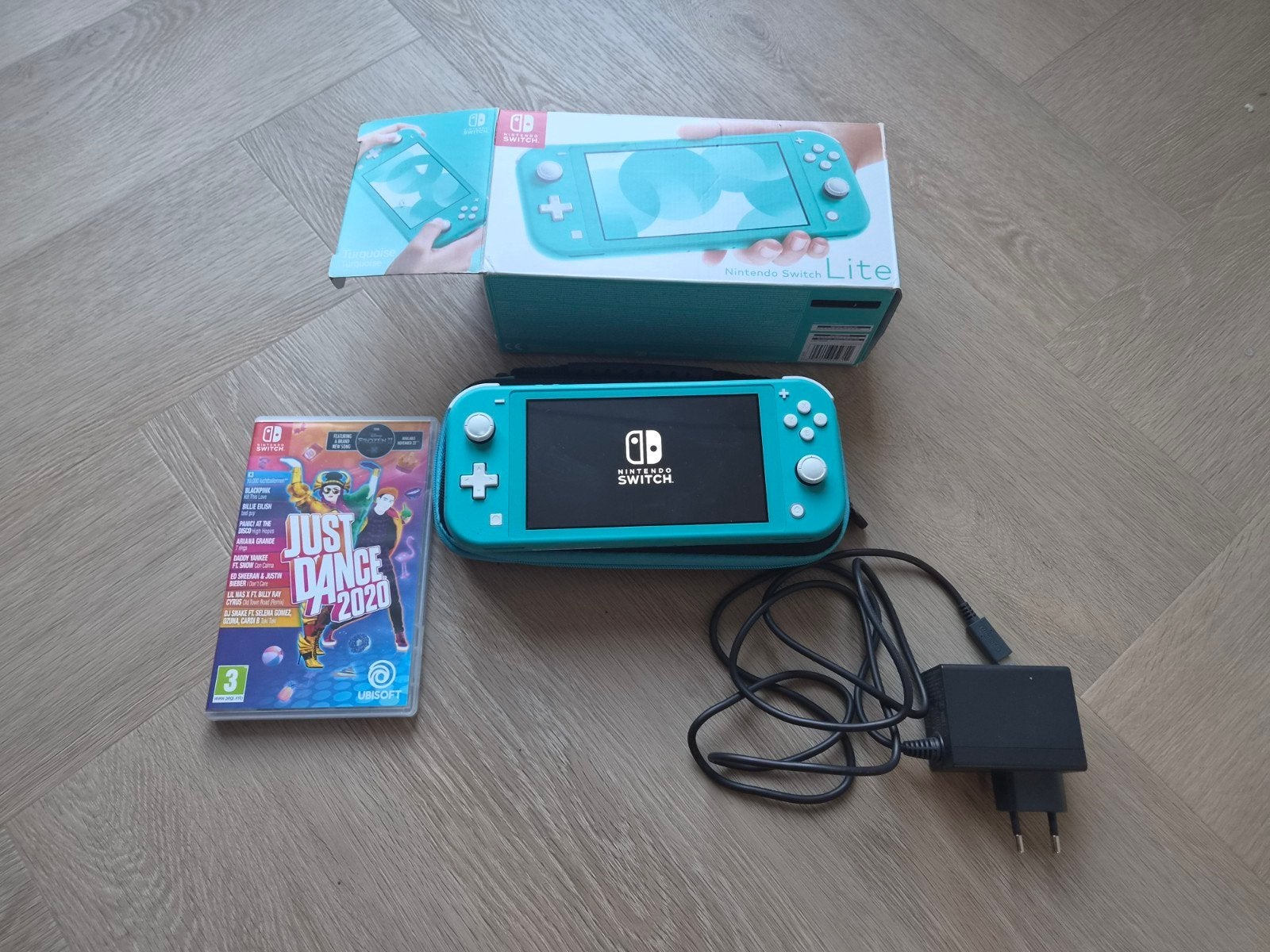Nintendo Switch Lite Handheld inclusief game en case, Ophalen of Verzenden, Turquoise, Gebruikt
