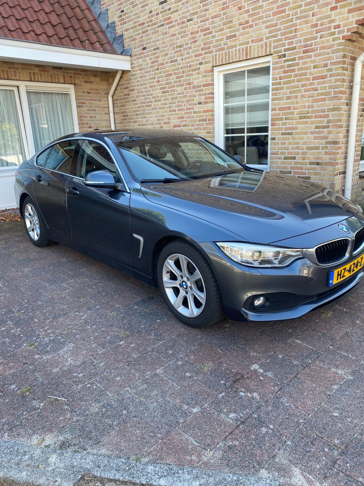 BMW 4-Serie 1.5 418I Gran Coupe 2016 Grijs, Auto's, Voorwielaandrijving, 136 pk, Zwart, 4-Serie