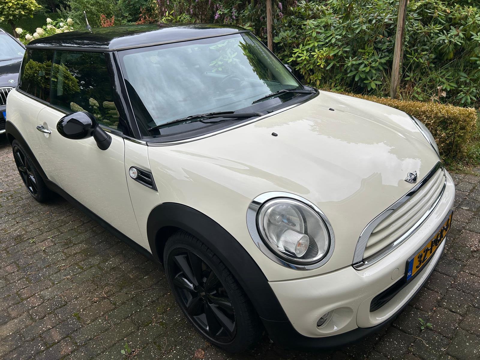 Mini (r56) 1.6 75pk 2011 Wit, Voorwielaandrijving, Stof, 4 stoelen, Wit