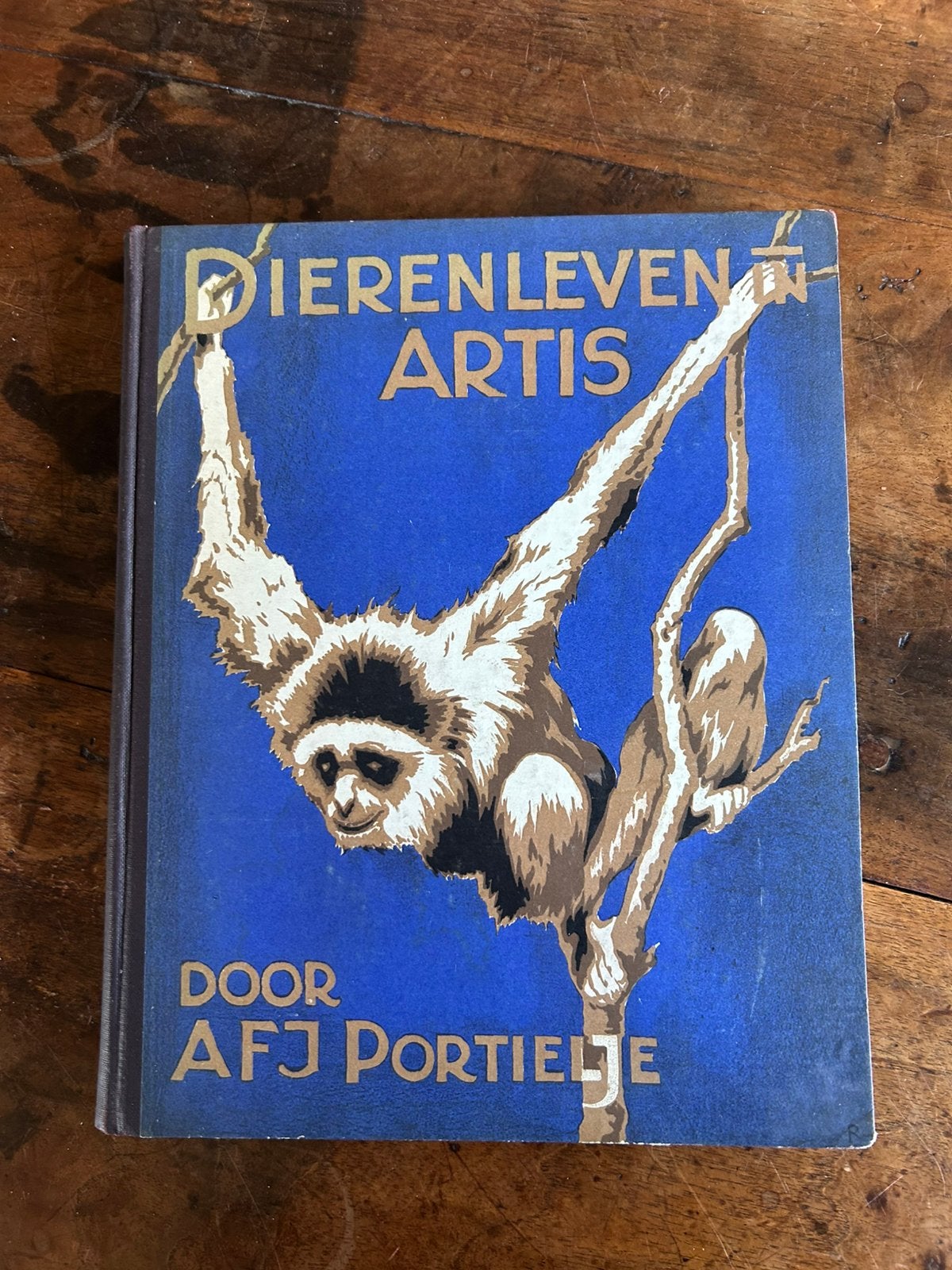 Dierenleven in Artis, vintage boek 1939, Boeken, Ophalen of Verzenden, Gelezen