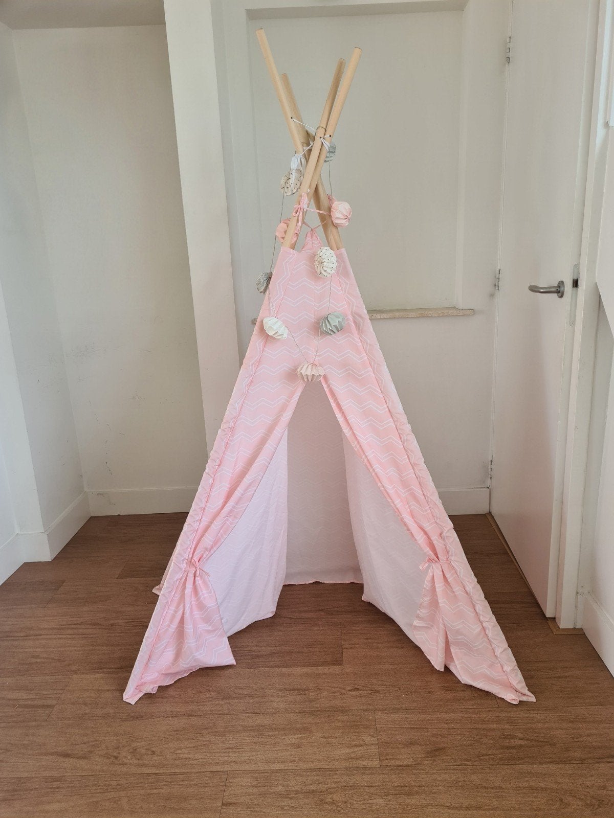 Roze tipi speeltent voor kinderen, Ophalen