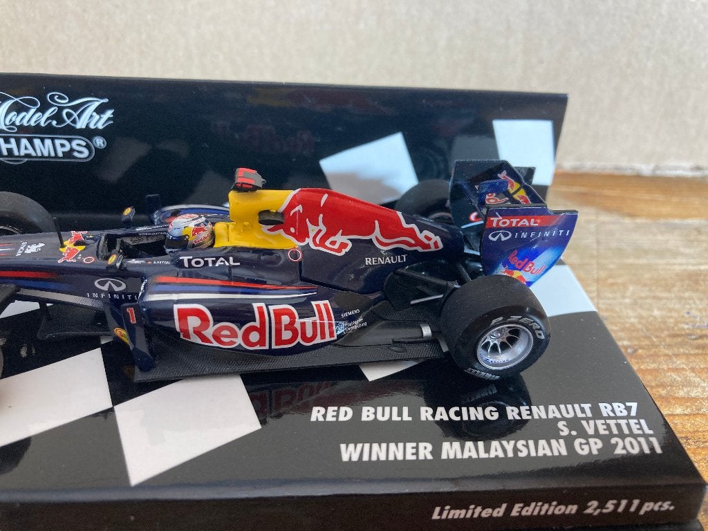 Sebastian Vettel 1:43 Winner Malaysian GP 2011 RB7, Ophalen of Verzenden, Nieuw, Formule 1