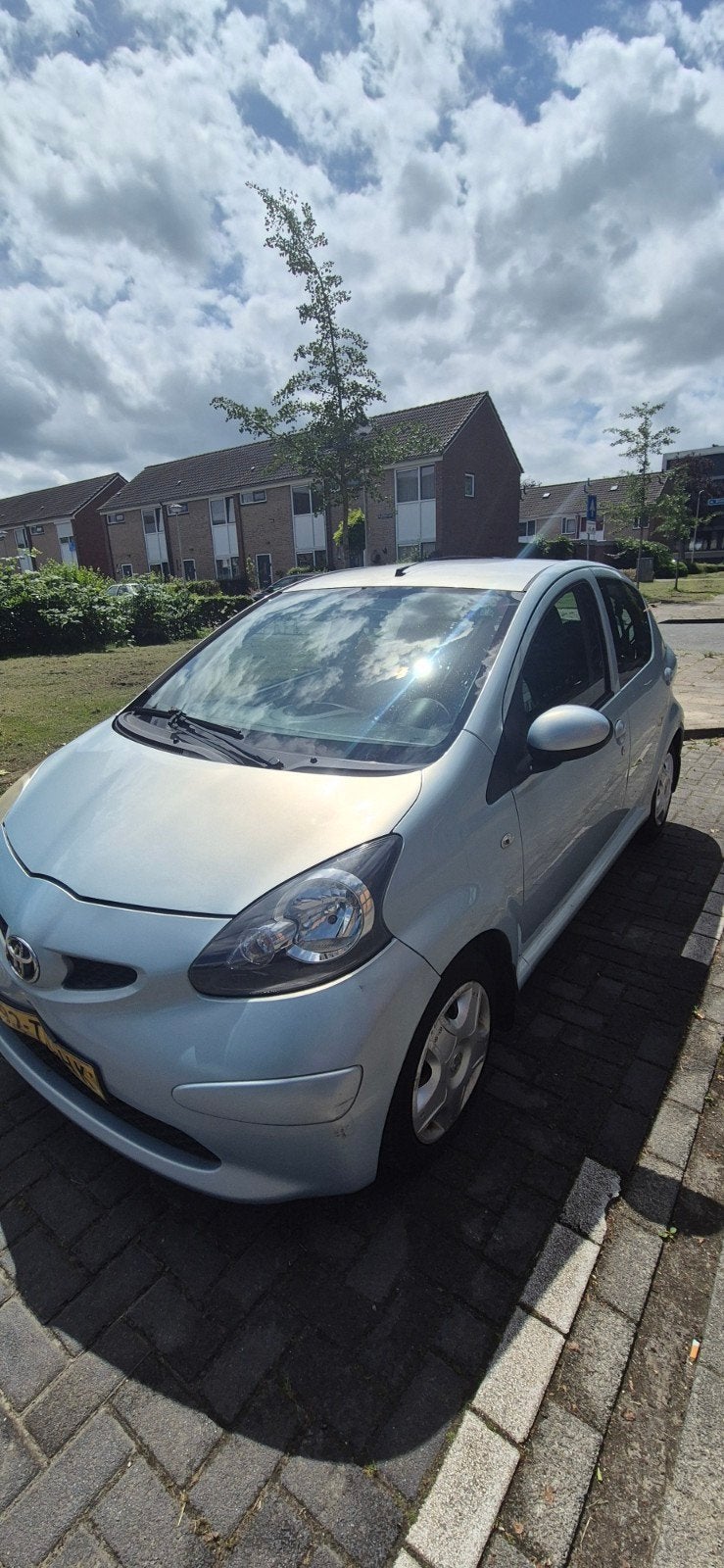 Toyota Aygo 1.0 12V VVT-i 2006 5D blauw met APK 27/02/27, Auto's, Toyota, Voorwielaandrijving, Stof, 10 cc, Zwart