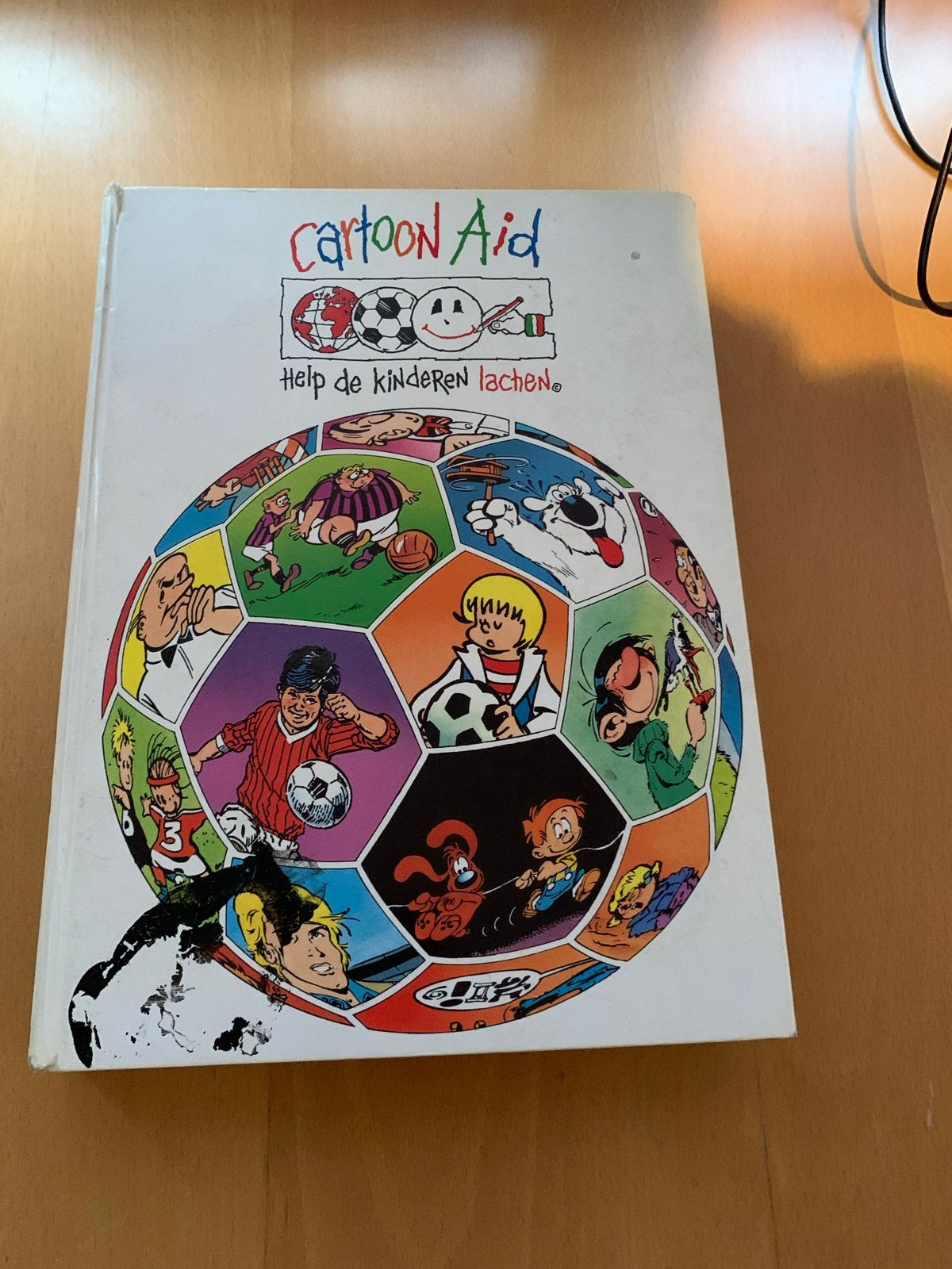 Cartoon Aid: Help de kinderen lachen, Eén stripboek, Ophalen of Verzenden, Gelezen