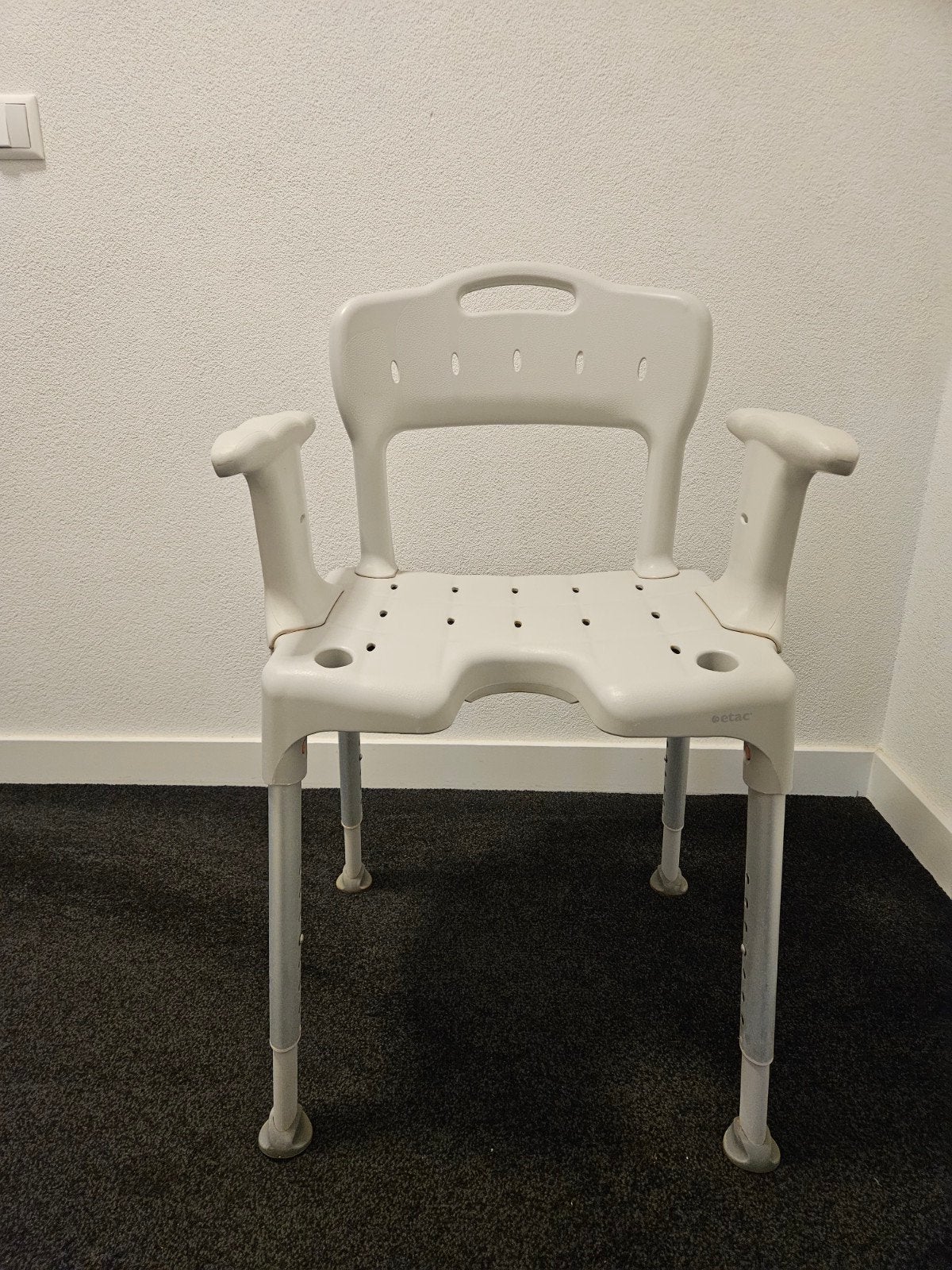 Douchestoel merk Etac, Ophalen